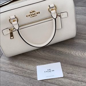 cream coach handbag